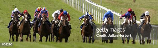 July 11: Darryll Holland and Continent land The Darley July Cup run at Newmarket Racecourse in Newmarket on July 11, 2002.