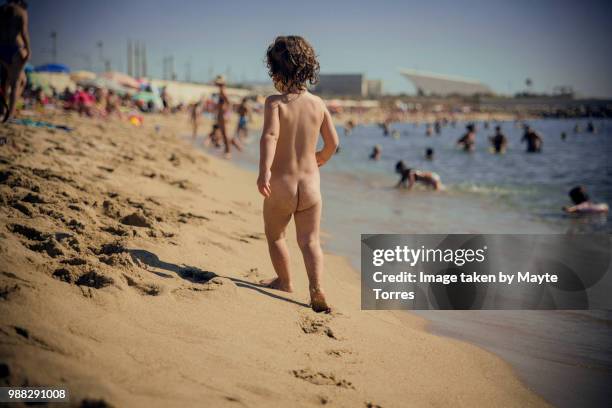 naked boy in the beach - bare beach stock pictures, royalty-free photos & images