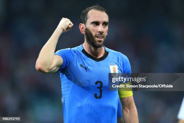 Diego Godin of Uruguay looks exhausted as he celebrates their 2-1 victory and advancement to the quarter-finals during the 2018 FIFA World Cup Russia...