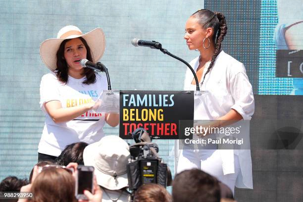 Artists America Ferrera and Alicia Keys read from affidavits from families that have been separated from their children during a rally with MoveOn,...