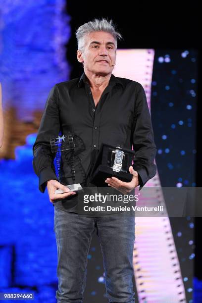 Luciano Ligabue is awarded during the Nastri D'Argento Award Ceremony on June 30, 2018 in Taormina, Italy.
