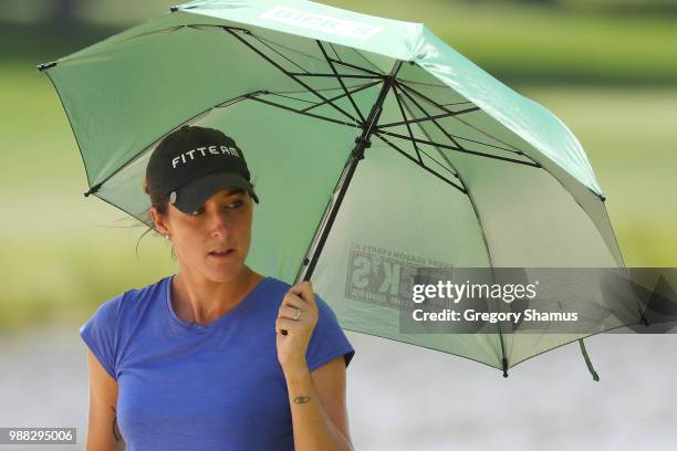 Jaye Marie Green shades her self on the third green during the final round of the 2018 KPMG PGA Championship at Kemper Lakes Golf Club on June 30,...