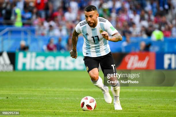 Nicolas Otamendi of Argentina runs with the ball during the 2018 FIFA World Cup Round of 16 match between France and Argentina at Kazan Arena in...