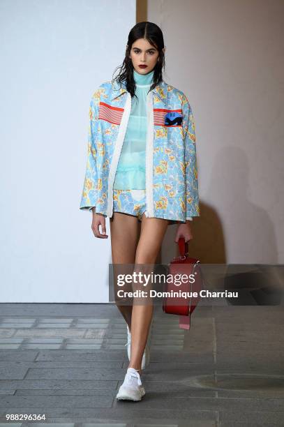 Kaia Gerber walks the runway during Miu Miu 2019 Cruise Collection Show at Hotel Regina on June 30, 2018 in Paris, France.