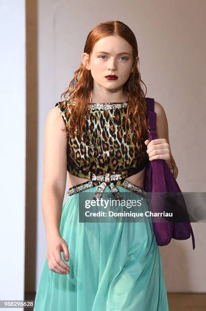 Sadie Sink walks the runway during Miu Miu 2019 Cruise Collection Show at Hotel Regina on June 30, 2018 in Paris, France.