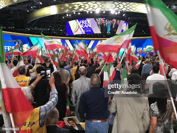 Thousands of Iranians gather during the event organized by National Council of Resistance of Iran at the Parc des Expositions de Villepinte in Paris,...