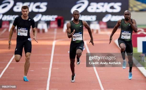 Christophe Lemaitre from France, Abdullah Abkar Mohammed from Saudi Arabia, and Churandy Martina from the Netherlands take part in the Men's 100m...