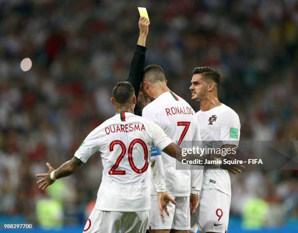 Cristiano Ronaldo of Portugal is given a yellow card during the final minutes of the 2018 FIFA World Cup Russia Round of 16 match between Uruguay and...