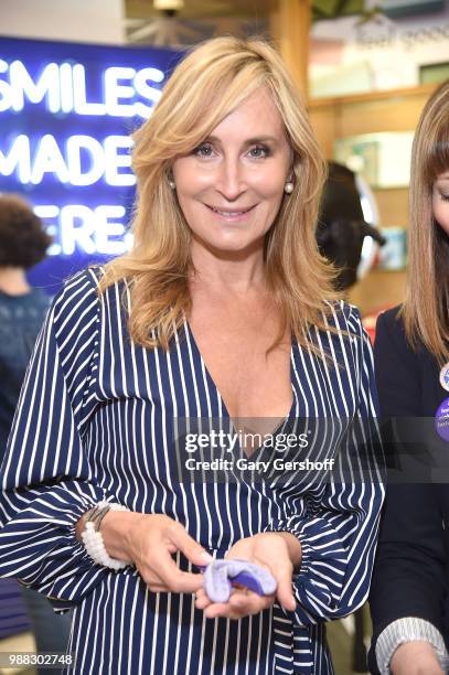 Real Housewives of New York star Sonja Morgan and Macy's celebrate the launch of SmileDirectClub's Smile Kit at Macy's Roosevelt Field Mall on June...