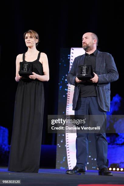 Paola Cortellesi and Antonio Albanese are awarded during the Nastri D'Argento Award Ceremony on June 30, 2018 in Taormina, Italy.