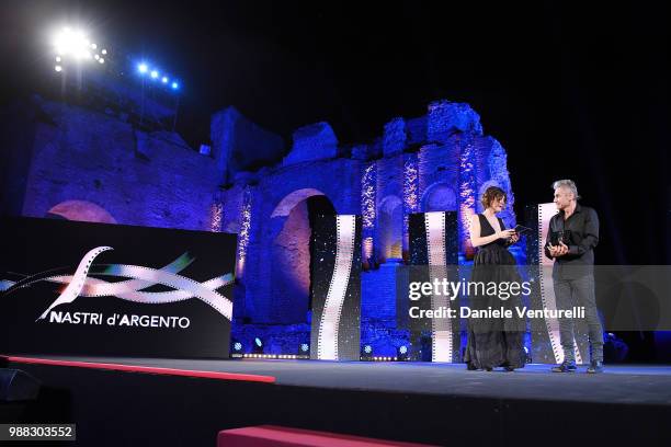 Carlotta Proietti introces Luciano Ligabue awarded during the Nastri D'Argento Award Ceremony on June 30, 2018 in Taormina, Italy.