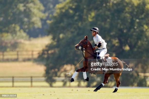 Prince Harry, Duke of Sussex takes part in the Audi Polo Challenge at Coworth Park Polo Club on June 30, 2018 in Ascot, England.