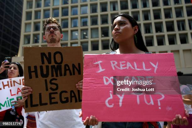 Demonstrators protest against Immigration and Customs Enforcement and the Trump administration's immigration policies at Daley Plaza, June 30, 2018...