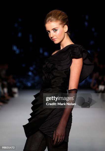 Model showcases designs on the catwalk at the Nicola Finetti collection show on the second day of Rosemount Australian Fashion Week Spring/Summer...