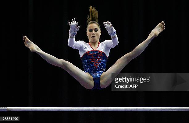 France's Pauline Morel performs on the uneven bars during the women seniors team final, in the European Artistic Gymnastics Championships 2010, at...
