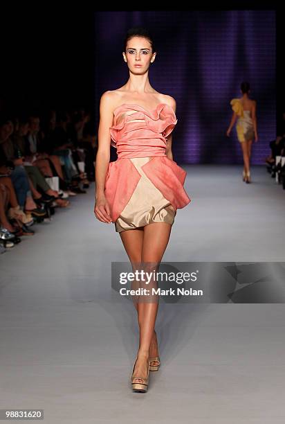 Model showcases designs on the catwalk at the Nicola Finetti collection show on the second day of Rosemount Australian Fashion Week Spring/Summer...