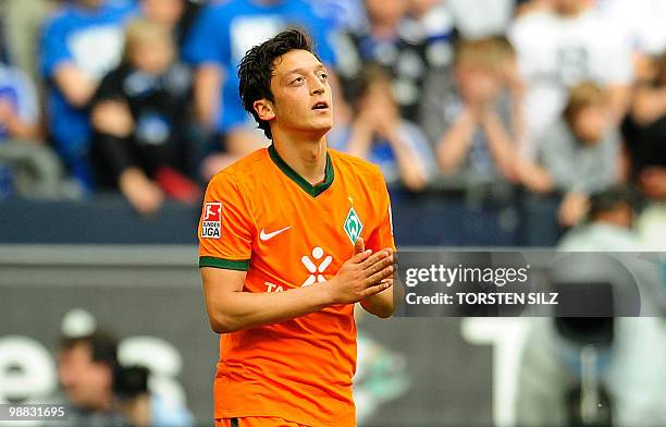 Werder Bremen's midfielder Mesut Oezil celebrates scoring during the German first division Bundesliga football match FC Schalke 04 vs Werder Bremen...