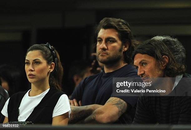 From left, Melissa Satta, Christian Vieri and Paolo Maldini sit in the stands during the Serie A match between AC Milan and ACF Fiorentina at Stadio...