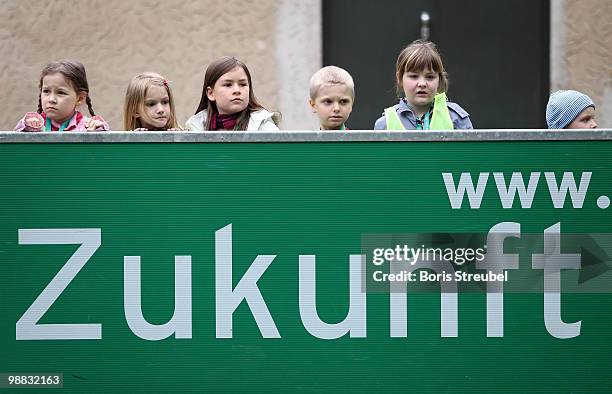 Pupils watch soccer on one of the DFB mini soccer fields on the day of action under the slogan 'Mitspielen kickt! Starke Kinder, Wahre Champions' at...