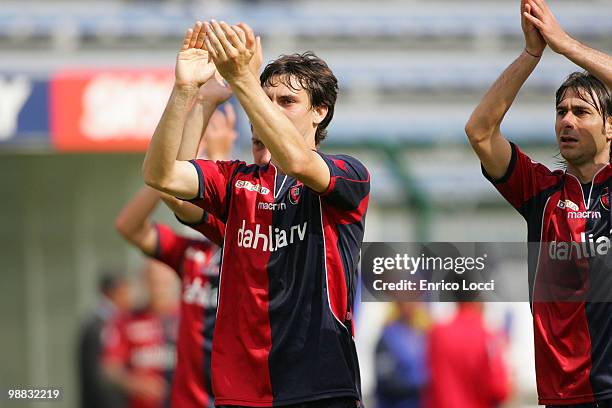 Davide Astori and Daniele Conti of Cagliari clap at the fans after the Serie A match between Cagliari and Udinese at Stadio Sant'Elia on May 2, 2010...