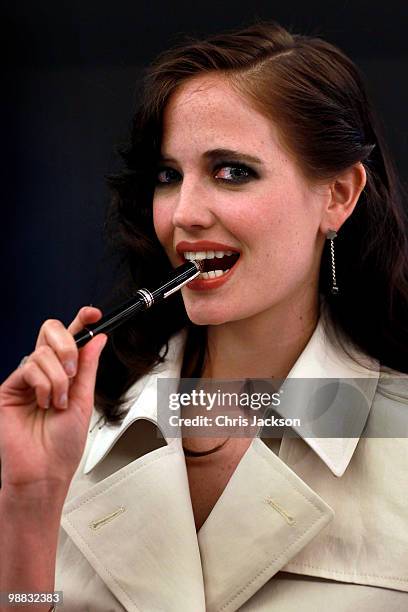 Actress and Montblanc ambassador Eva Green poses with the new Montblanc Meisterstuck Diamond writing intrument at Harrods on May 4, 2010 in London,...