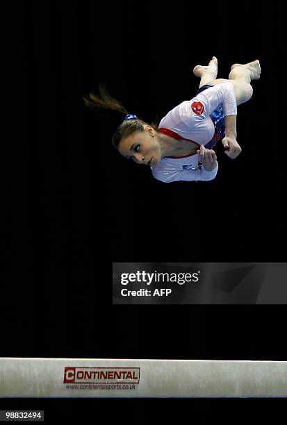 France's Pauline Morel performs on the beam during the women seniors team final, in the European Artistic Gymnastics Championships 2010, at the...