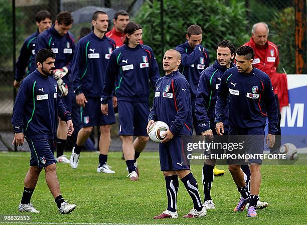 Italy's Gennaro Gattuso, Fabio Cannavaro, Giampaolo Pazzini, and Marco Borriello play the ball during a training session of the Italian national...