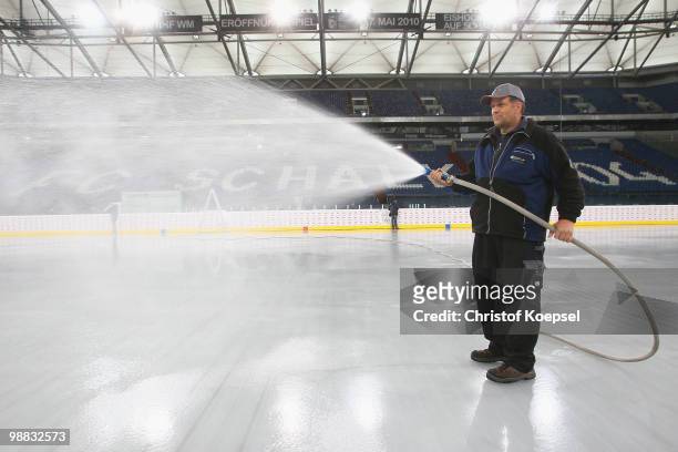 Ice maker Herbert Spielmann prepares the ice rink of the Veltins Arena ahead of the IIHF World Championship on May 4, 2010 in Gelsenkirchen, Germany....
