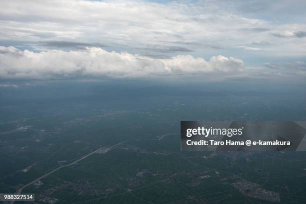 Rice Paddy And Field In Niigata City In Japan Sunset Time Aerial View From Airplane High-Res Stock Photo