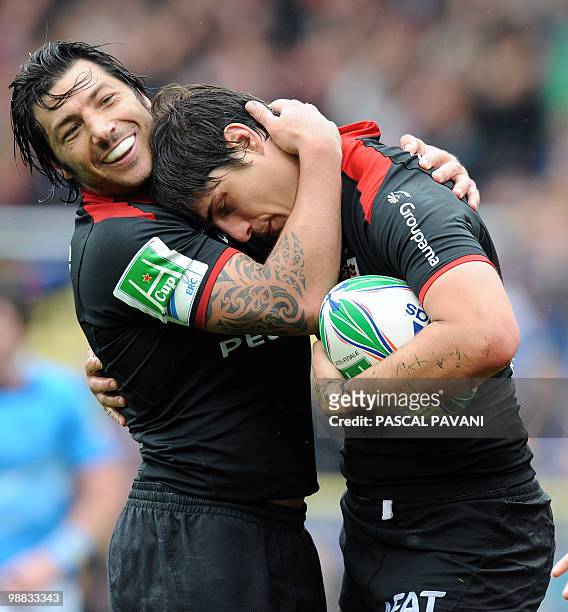Toulouse's outside-half David Skrela and scrum-half Byron Kelleher celebrate after scoring a try during their European cup rugby union semi-final...