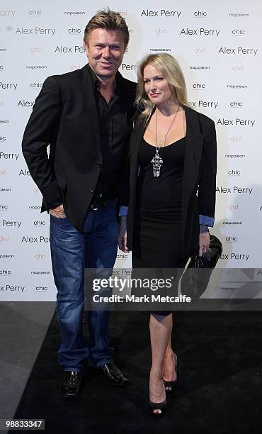Personality Richard Wilkins and partner Rebecca Naso arrive at the Alex Perry collection show on the second day of Rosemount Australian Fashion Week...