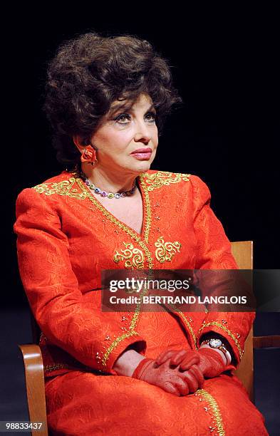 Italian actress Gina Lollobrigida poses during a ceremony in hommage to French legend actor Gerard Philipe to commemorate the 50th birthday of his...