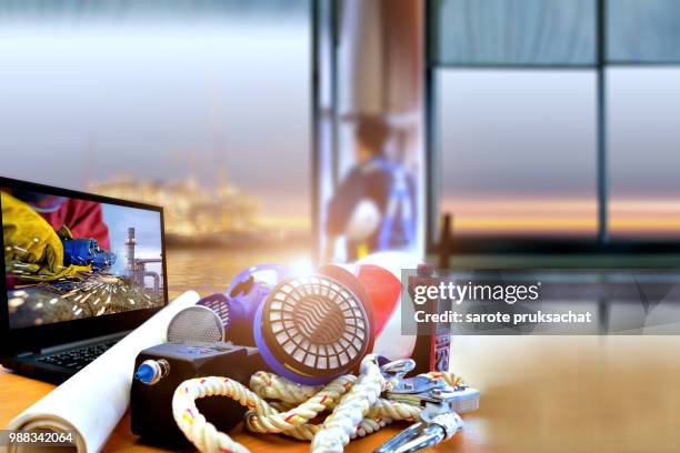 safety standard set  on working table of professional architect working table in office - sports team event - fotografias e filmes do acervo