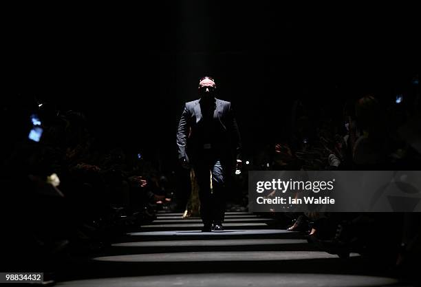 Designer Alex Perry appears on the catwalk following his collection show on the second day of Rosemount Australian Fashion Week Spring/Summer 2010/11...