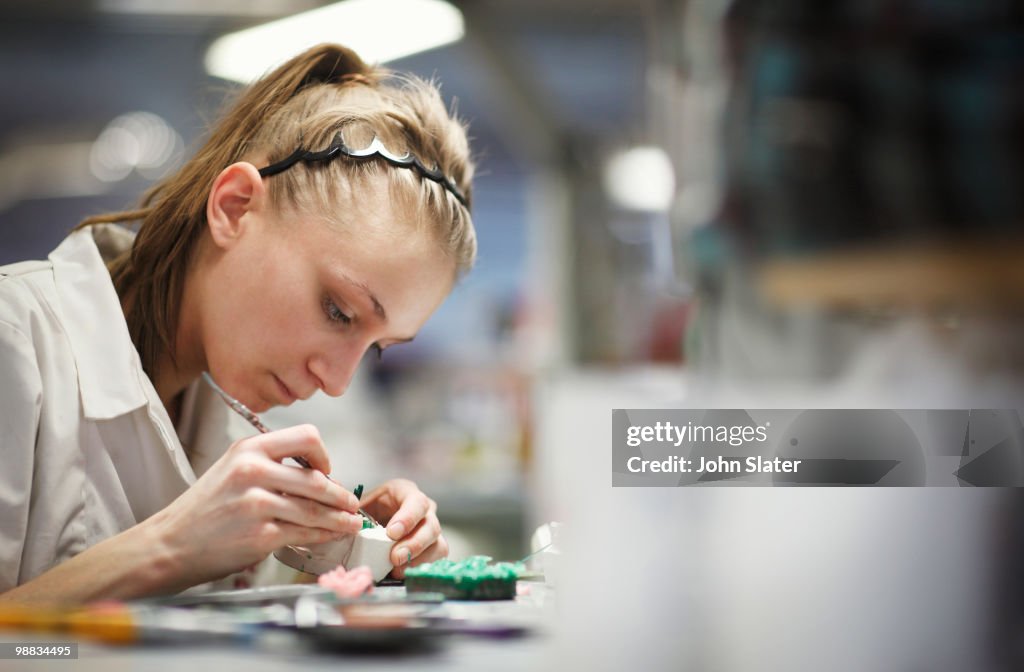 Female lab technician working at bench