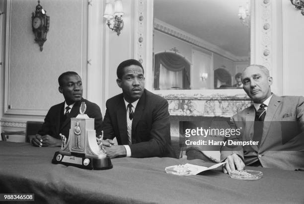 West Indies cricketers, from left, vice captain Conrad Hunte , captain Garfield Sobers and West Indies team manager Jeff Stollmeyer pictured together...