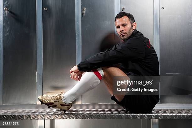 Ryan Giggs of Manchester United poses for a portrait session wearing the Reebok RG800 football boot on March 18, 2010 in Manchester, England.