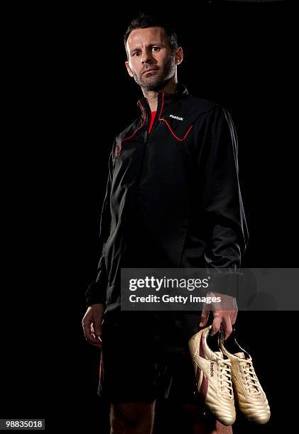 Ryan Giggs of Manchester United poses for a portrait session wearing the Reebok RG800 football boot on March 18, 2010 in Manchester, England.