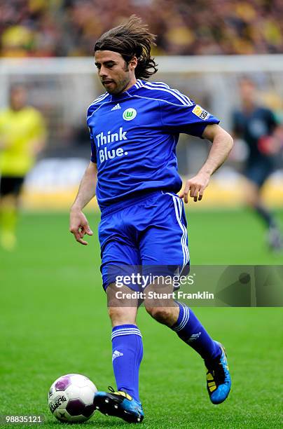 Andrea Barzagli of Wolfsburg runs with the ball during the Bundesliga match between Borussia Dortmund and VfL Wolfsburg at Signal Iduna Park on May 1...