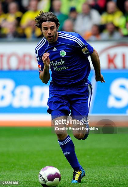 Andrea Barzagli of Wolfsburg runs with the ball during the Bundesliga match between Borussia Dortmund and VfL Wolfsburg at Signal Iduna Park on May 1...