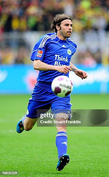 Andrea Barzagli of Wolfsburg runs with the ball during the Bundesliga match between Borussia Dortmund and VfL Wolfsburg at Signal Iduna Park on May 1...