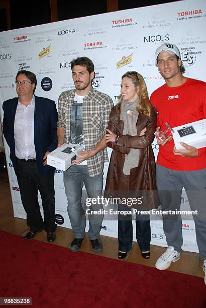 Angel Martin, Iker Casillas, Genoveva Casanova and Feliciano Lopez attend the 'I Charity Paddle Tournament' on May 4, 2010 in Madrid, Spain.