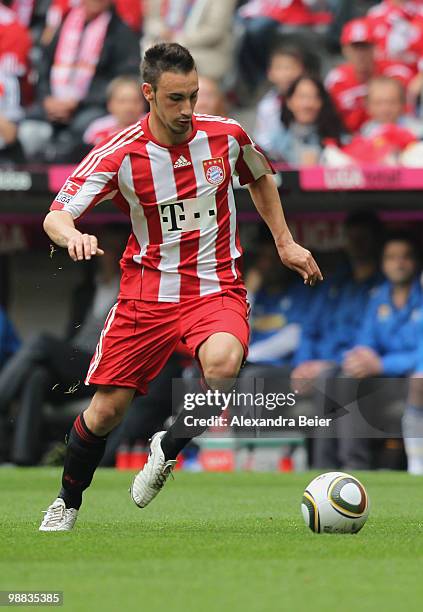 Diego Contento of Bayern Muenchen runs with the ball during the Bundesliga match between FC Bayern Muenchen and VfL Bochum at Allianz Arena on May 1,...