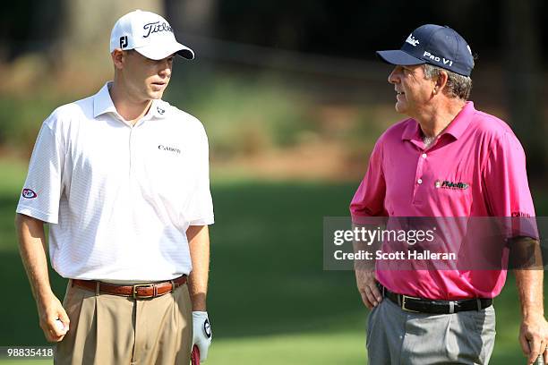 Bill Haas talks with his father Jay Haas during a practice round prior to the start of THE PLAYERS Championship held at THE PLAYERS Stadium course at...