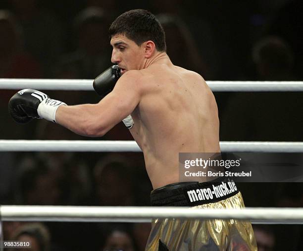Marco Huck of Germany punches during his WBO World Championship Cruiserweight title fight against Brian Minto of the U.S.at the Weser-Ems-Halle on...