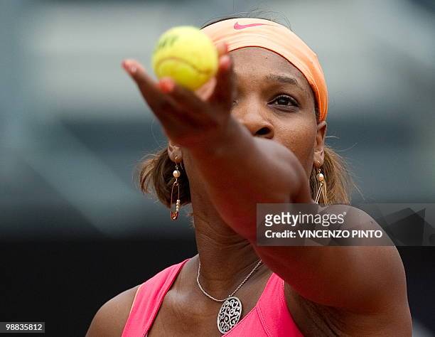 Serena Williams serves to Switzerland's Timea Bacsinszky during their third round match of the WTA Rome Open on May 4, 2010 at the Foro Italico in...