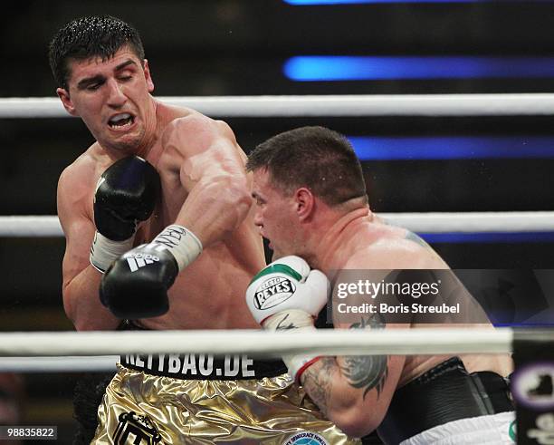 Marco Huck of Germany and Brian Minto of the U.S. Exchange punches during their WBO World Championship Cruiserweight title fight at the...