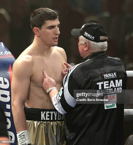 Coach Hans-Ullrich Wegner gives advices to his boxer Marco Huck of Germany during his WBO World Championship Cruiserweight title fight against and...