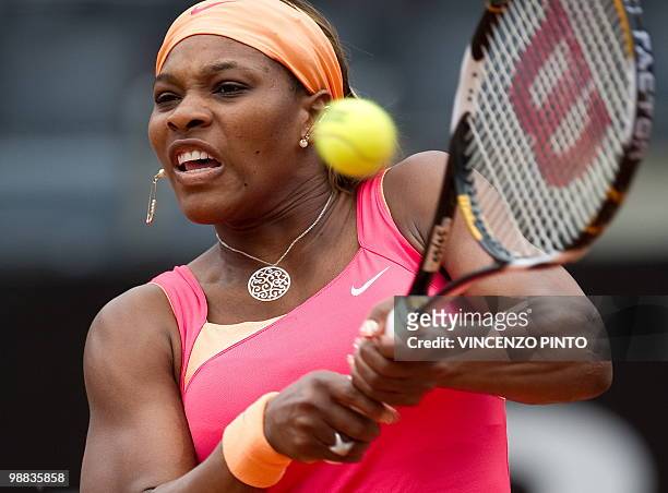 Serena Williams returns a backhand to Switzerland's Timea Bacsinszky during their third round match of the WTA Rome Open on May 4, 2010 at the Foro...