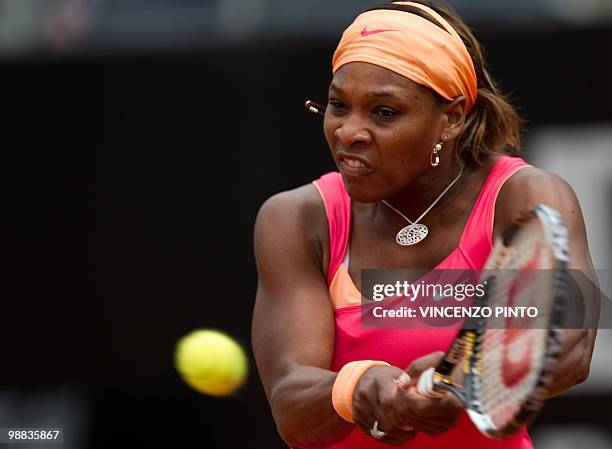 Serena Williams returns a backhand to Switzerland's Timea Bacsinszky during their third round match of the WTA Rome Open on May 4, 2010 at the Foro...